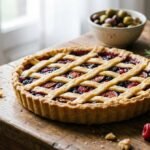 Scopri la crostata con frolla all’olio: la ricetta facile e irresistibile che rivoluzionerà le tue merende