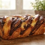 Da quando preparo questa brioche al cacao con inserto congelato da 15 g, nessuno crede che il cuore scorra ancora dopo il taglio : impasto a 24°C, 1 ora e 30 di lievitazione e forno a 230°C per 7 minuti